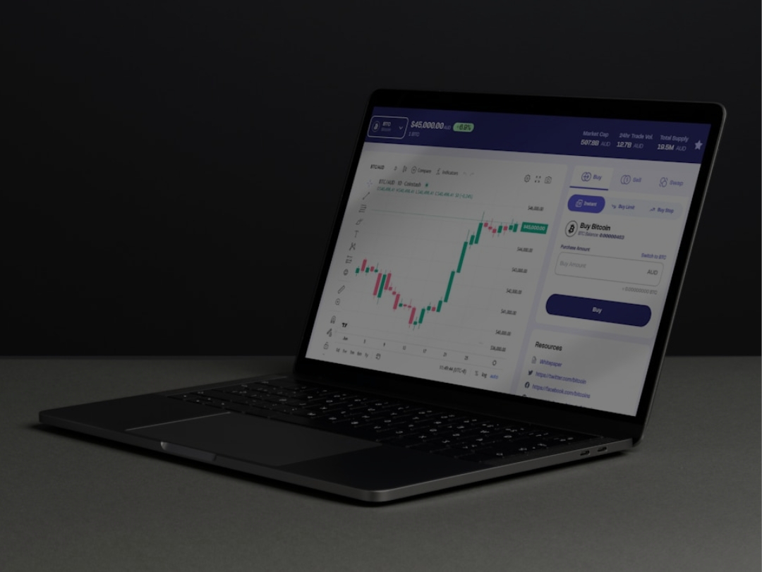 A laptop displaying an algorithmic cryptocurrency trading interface for Bitcoin and other digital assets managed by Aspen Sage Investment Fund.
